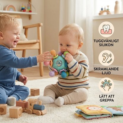 Sensorisk babygreppboll med silikonbitring och skallra