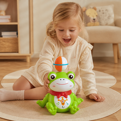 Interaktiv Groda Som Balanserar En Boll Med Ljus, Musik Och 360° Rotation